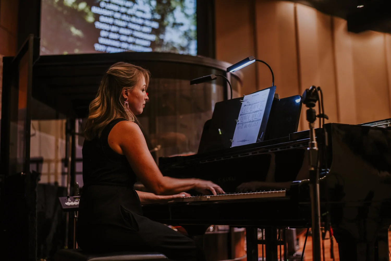 A music instructor playing the piano