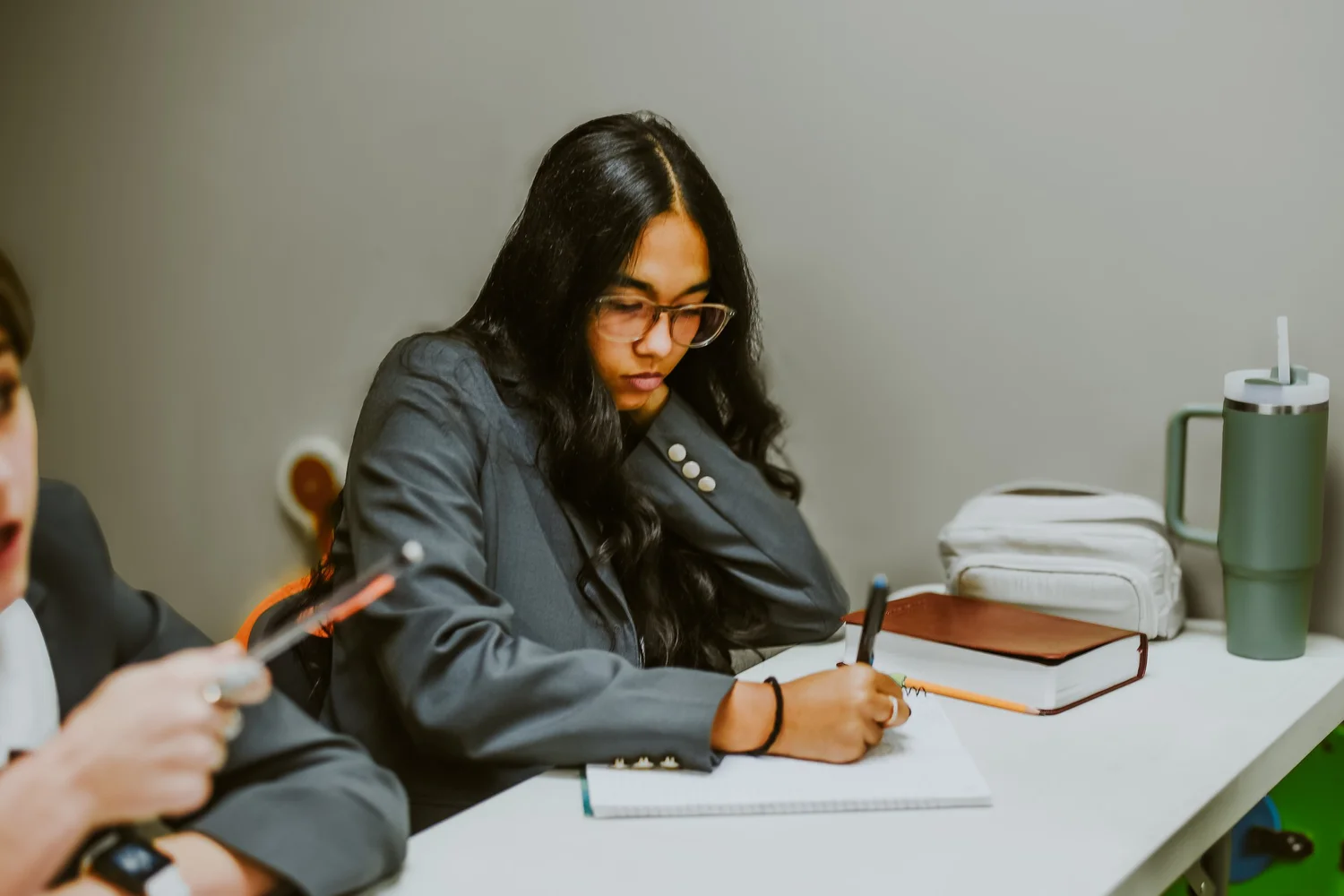 A rhetoric school student studying